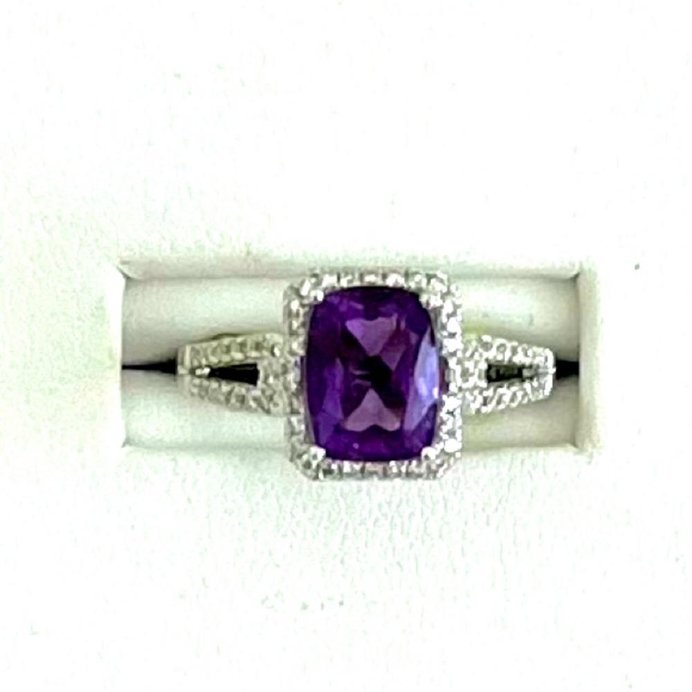 Ladies genuine amethyst and natural diamond 14kt white gold ring.